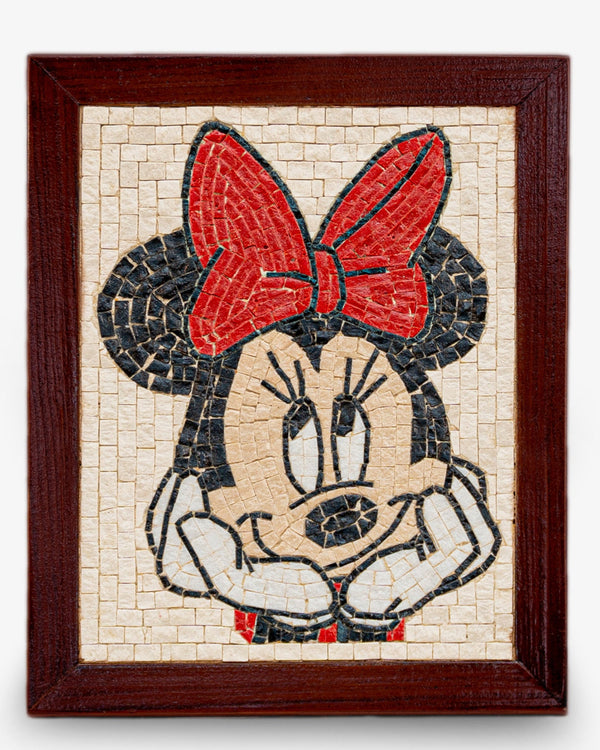 Handcrafted mosaic art featuring Minnie Mouse with a vibrant red bow — detailed stonework framed in dark wood