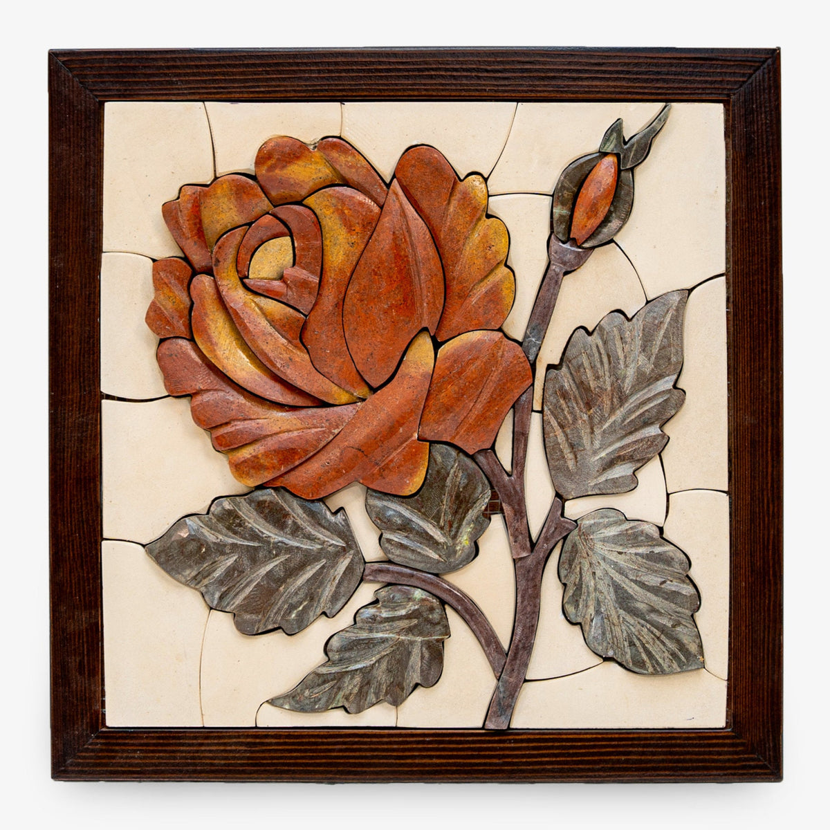 Intricate wall art featuring a vibrant orange rose crafted from ceramic and metal with detailed leaves and a wooden frame