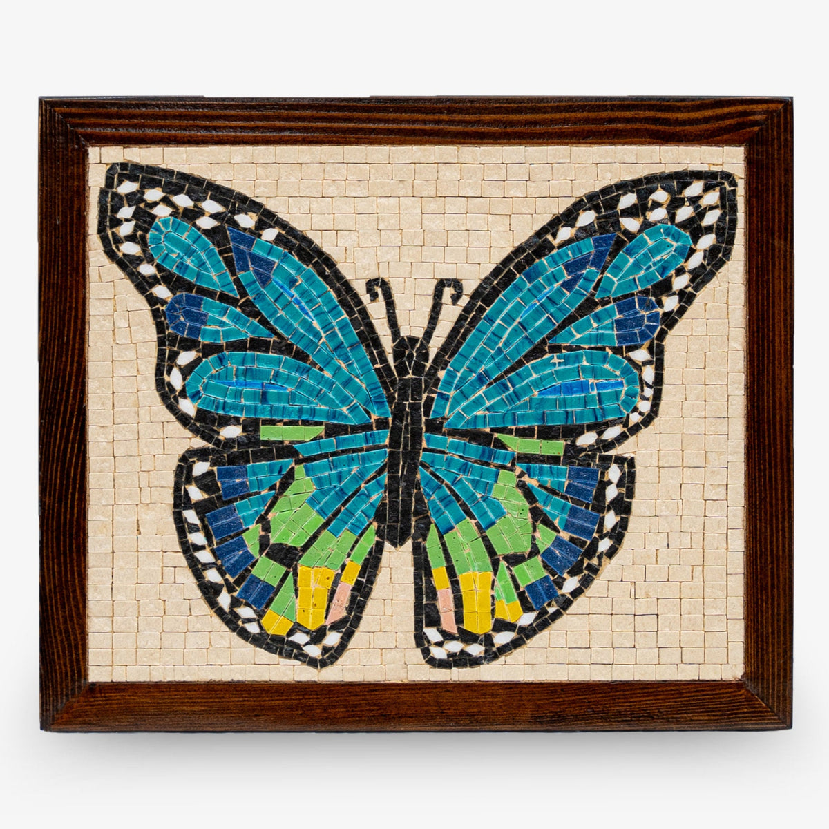 Colorful mosaic butterfly wall art featuring vibrant blue and green tiles set in a dark wooden frame