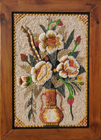 Intricate mosaic art featuring a floral arrangement in a wooden frame — vibrant colours and detailed textures create a stunning display.