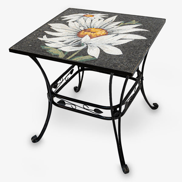Elegant mosaic side table with a floral design in black and white — featuring a sturdy wrought iron base.