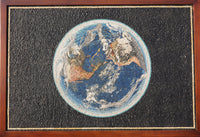 Intricate mosaic art depicting the Earth with vibrant blue oceans and detailed landmasses framed in rich wood.
