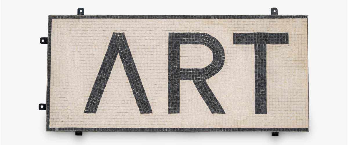 Decorative wall art with 'ART' and a lambda symbol on a white background