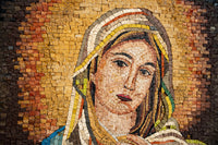 Intricate mosaic artwork depicting a serene figure with warm tones and detailed facial features, showcasing artistic craftsmanship.