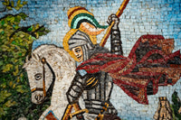 Intricate mosaic artwork depicting a knight in armor with a flowing red cape, riding a white horse amidst vibrant colors.