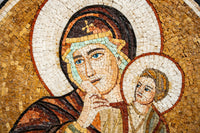 Intricate mosaic artwork depicting a serene mother and child with vibrant colors and detailed facial expressions