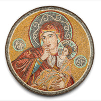Intricate mosaic art featuring a serene Madonna holding a child, with warm golden tones and detailed craftsmanship.