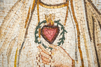 Intricate mosaic artwork featuring a heart encircled by leaves and beads, showcasing detailed craftsmanship and vibrant colors.