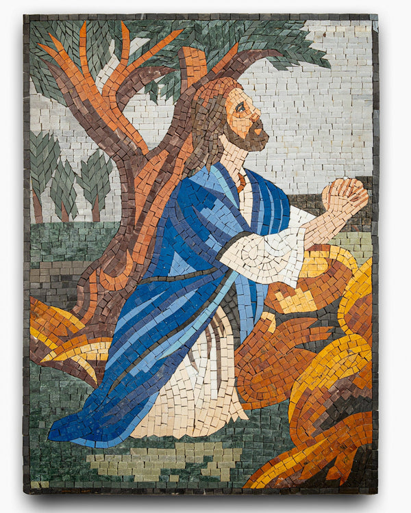 Vibrant mosaic artwork depicting a praying figure in a blue robe with intricate tile details against a natural backdrop.