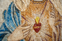 Intricate mosaic artwork featuring a heart design in warm tones — detailed craftsmanship with a radiant golden flame.