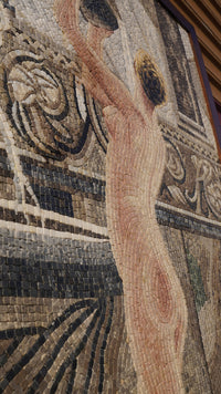Intricate mosaic artwork showcasing a nude figure with soft, natural tones and detailed patterns in a textured finish