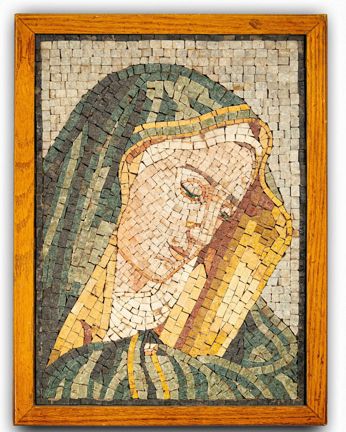 Intricate mosaic art piece featuring a serene figure with earthy tones framed in a warm wooden border.