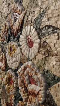 Intricate floral mosaic art featuring delicate petals in shades of cream and earthy tones — a textured masterpiece of craftsmanship.