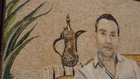 Intricate mosaic artwork featuring a man and a traditional Arabic coffee pot — textured tiles create a vivid scene.
