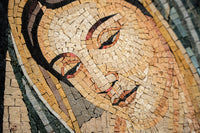 Intricate mosaic art featuring a serene face composed of various natural stone tiles — warm earth tones create depth and texture.