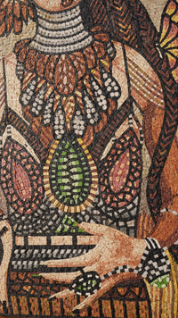 Intricate mosaic art featuring a detailed depiction of a woman adorned in vibrant colors with ornate jewelry and patterns.