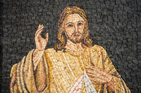 Intricate mosaic artwork depicting a serene figure with flowing hair and robes, showcasing detailed craftsmanship in muted tones.