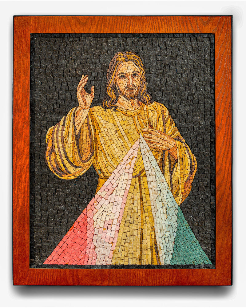 Intricate mosaic artwork depicting a figure in a flowing robe with vibrant red and green rays — framed in rich wooden borders.