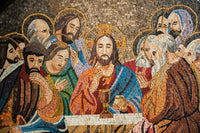Vibrant mosaic depicting a religious scene with Christ and disciples, showcasing intricate tile work and rich colors.