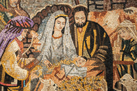 Detailed mosaic artwork depicting the nativity scene with vibrant colors and intricate textures capturing the holy family.