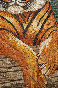 Intricate mosaic artwork featuring warm orange and yellow tones — a detailed depiction of a tiger's paws.