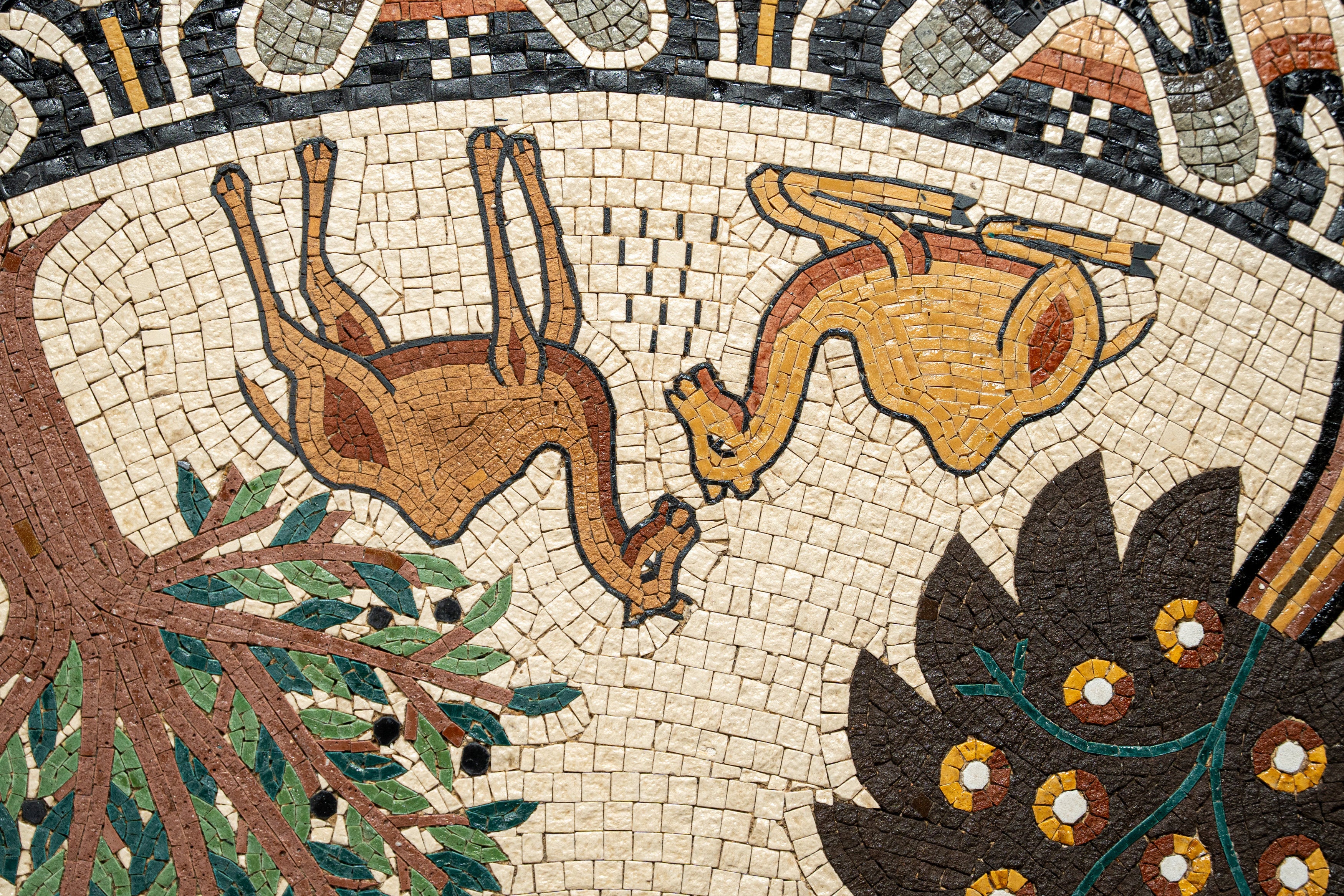 Intricate mosaic featuring two stylized animals in earthy tones — a vibrant depiction of nature's harmony.