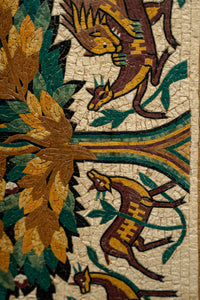 Intricate mosaic art featuring vibrant lizards and foliage in earthy tones — a detailed and textured decorative piece