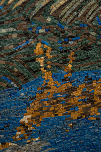 Intricate mosaic artwork featuring vibrant blue and earthy tones—detailed craftsmanship showcasing artistic depth.