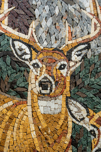 Intricate mosaic artwork depicting a deer with warm brown and golden tones, surrounded by textured green foliage.