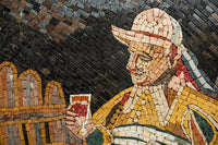 Intricate mosaic art depicting a man holding a drink, featuring vibrant ceramic tiles in earthy tones.
