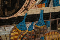 Intricate mosaic artwork featuring vibrant blue and earthy tones — showcasing detailed craftsmanship in each tile.
