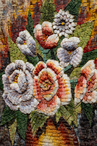 Intricate floral mosaic art featuring vibrant roses and delicate leaves — a stunning display of craftsmanship and color.