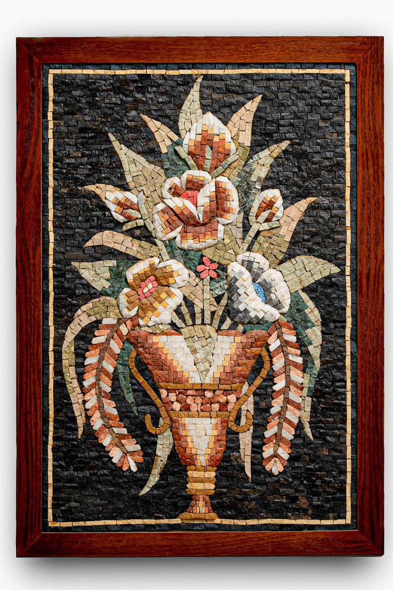 Intricate mosaic wall art featuring a floral arrangement in a wooden frame — vibrant colors create a stunning visual effect.