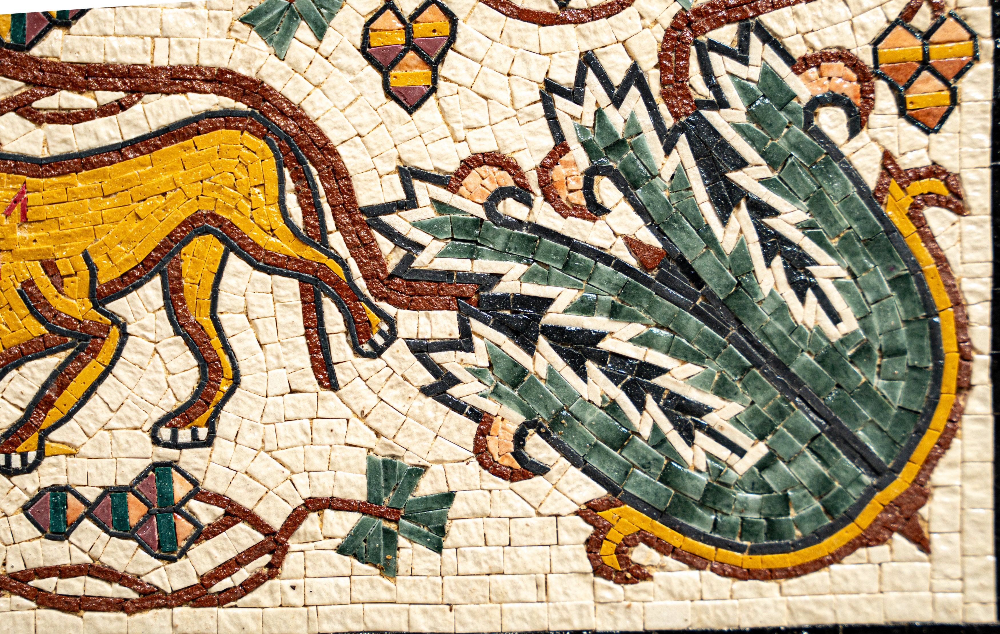 Intricate mosaic artwork featuring a yellow lion and green foliage with detailed textures and vibrant colors