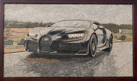 Intricate mosaic artwork featuring a sleek black Bugatti Chiron on a textured background — showcasing detailed craftsmanship and design.