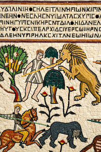 Intricate mosaic artwork depicting a lion confronting a hunter amidst vibrant trees and animals, showcasing ancient craftsmanship.