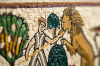 Intricate mosaic artwork depicting a warrior with a spear confronting a lion — vibrant colors and detailed textures enhance the scene.