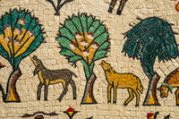 Colorful mosaic artwork featuring stylized trees and animals — intricate tile design with vibrant hues and detailed patterns