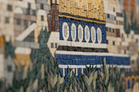 Intricate mosaic artwork featuring vibrant blue and earthy tones—detailed craftsmanship showcasing various textures.