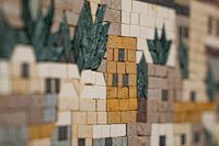 Intricate mosaic wall art featuring earthy tones and textured tiles—captivating design with natural elements.