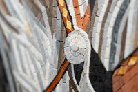 Intricate mosaic art featuring a blend of earthy tones and geometric patterns — a captivating display of craftsmanship.