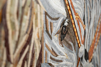 Intricate mosaic artwork depicting a horse's eye with earthy tones and detailed textures creating a lifelike appearance