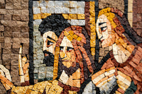 Intricate mosaic artwork featuring stylized figures in warm earth tones — textured tiles create a vivid narrative scene