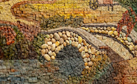 Intricate mosaic art featuring textured stones and earthy tones — a captivating blend of natural materials and craftsmanship.