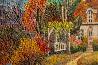 Intricate mosaic artwork featuring vibrant colors and detailed textures that evoke a charming outdoor scene