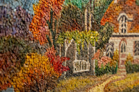 Intricate mosaic artwork featuring vibrant autumn foliage and a charming garden bench — a stunning display of textured colors.