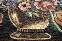 Intricate mosaic vase design featuring colorful floral patterns — crafted with detailed stone tiles for a textured finish