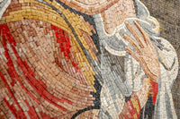 Intricate mosaic artwork featuring vibrant red, beige, and gray tiles—depicting a serene figure with delicate details.