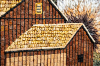 Intricate mosaic artwork depicting rustic houses in warm earth tones with textured stone details and a vibrant sunburst background