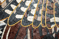 Intricate mosaic art featuring a blend of earthy browns and blacks with delicate golden accents creating a stunning texture